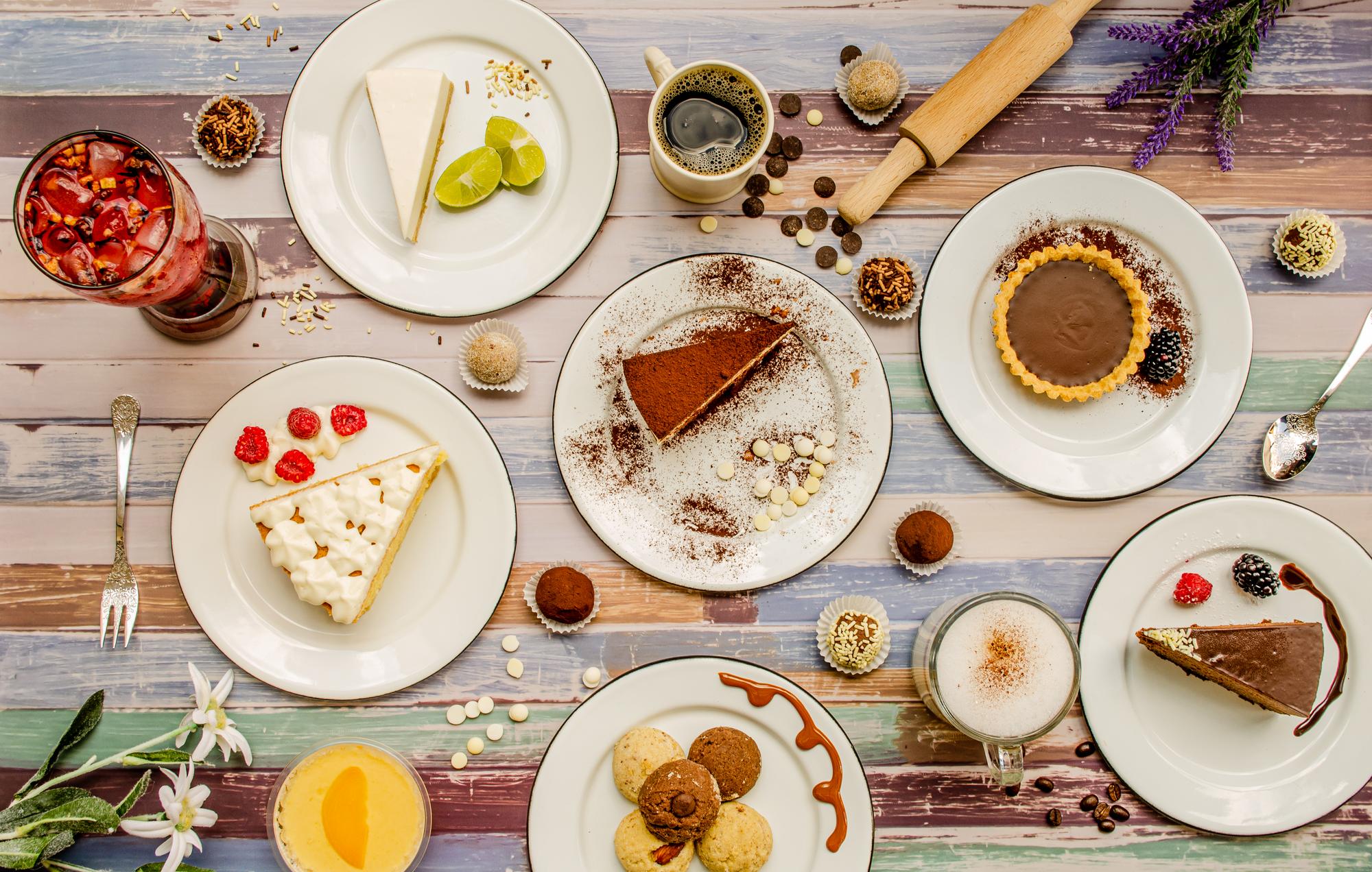 Assorted plated desserts on rustic table