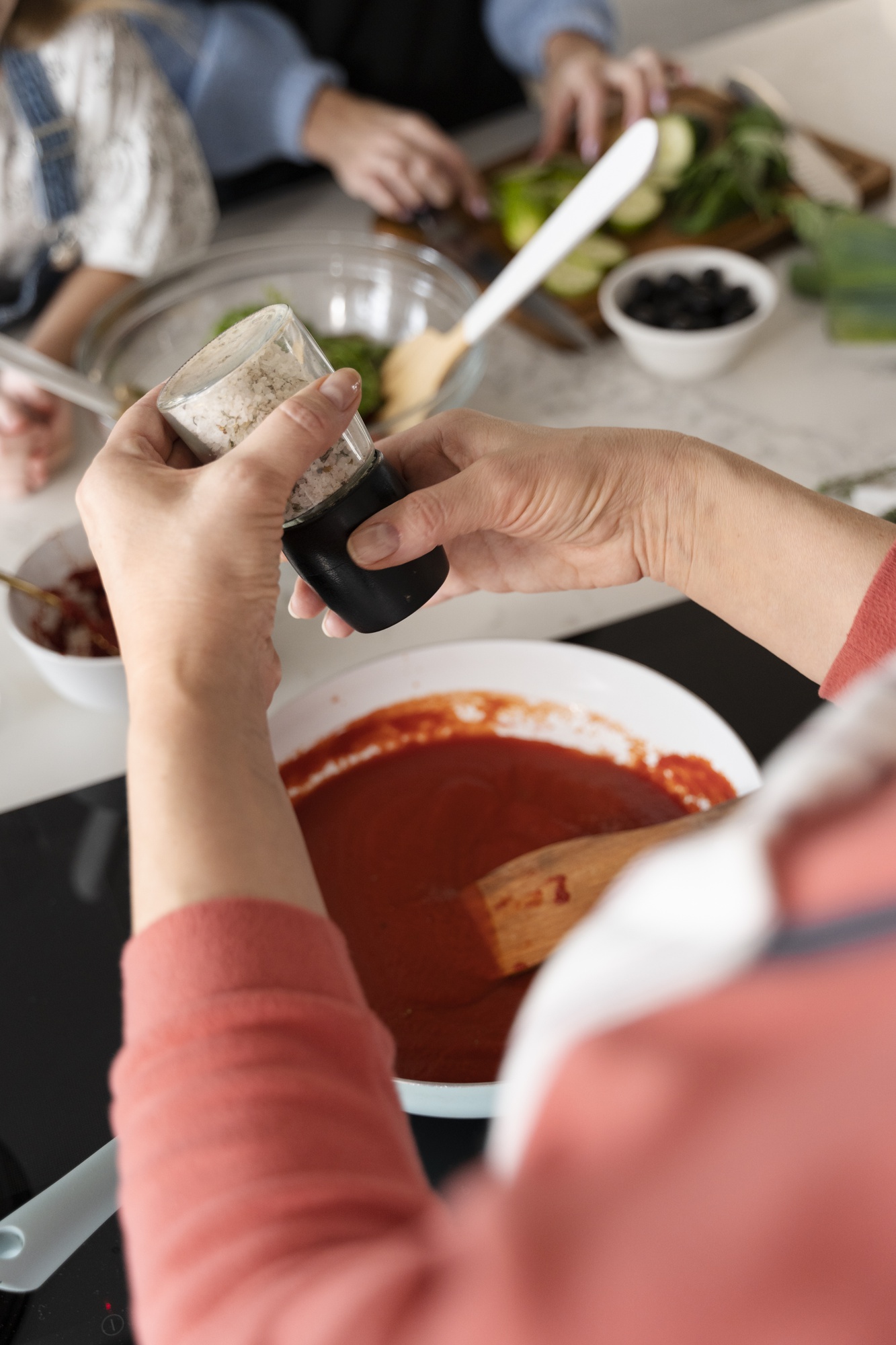 Workshop participants tasting sauces
